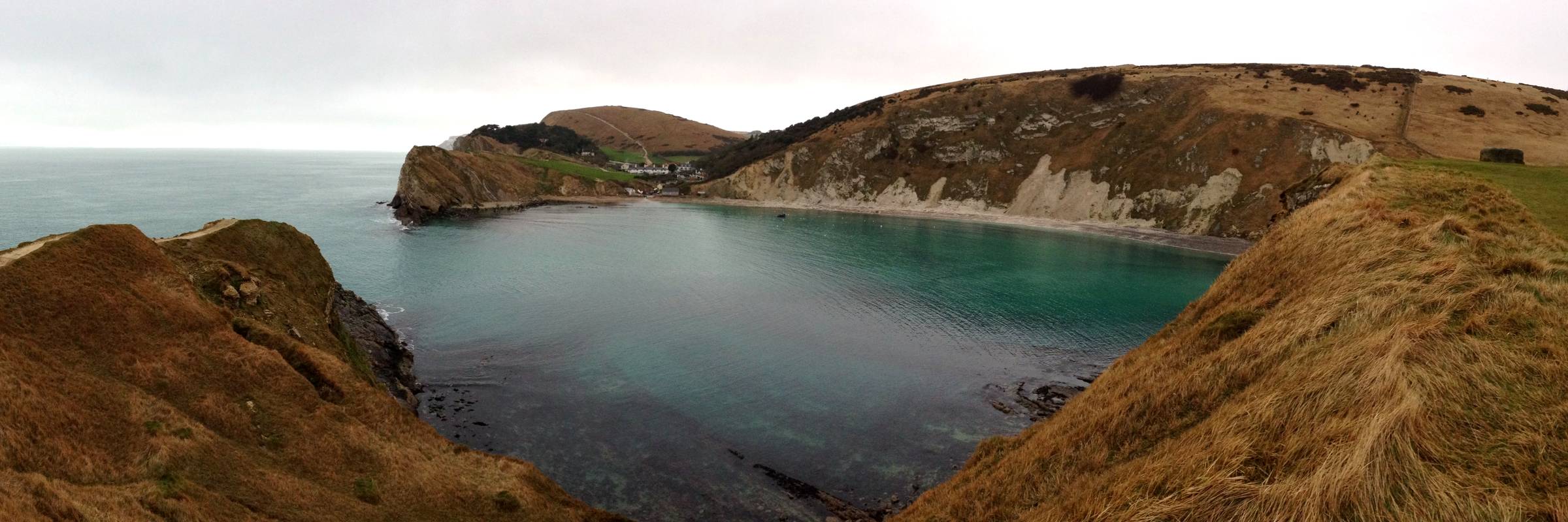 Lulworth Cove on the Jurassic Coast, seen from the cliffs above
